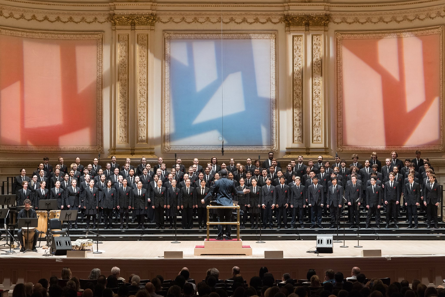 Shavon Lloyd conducting a choir